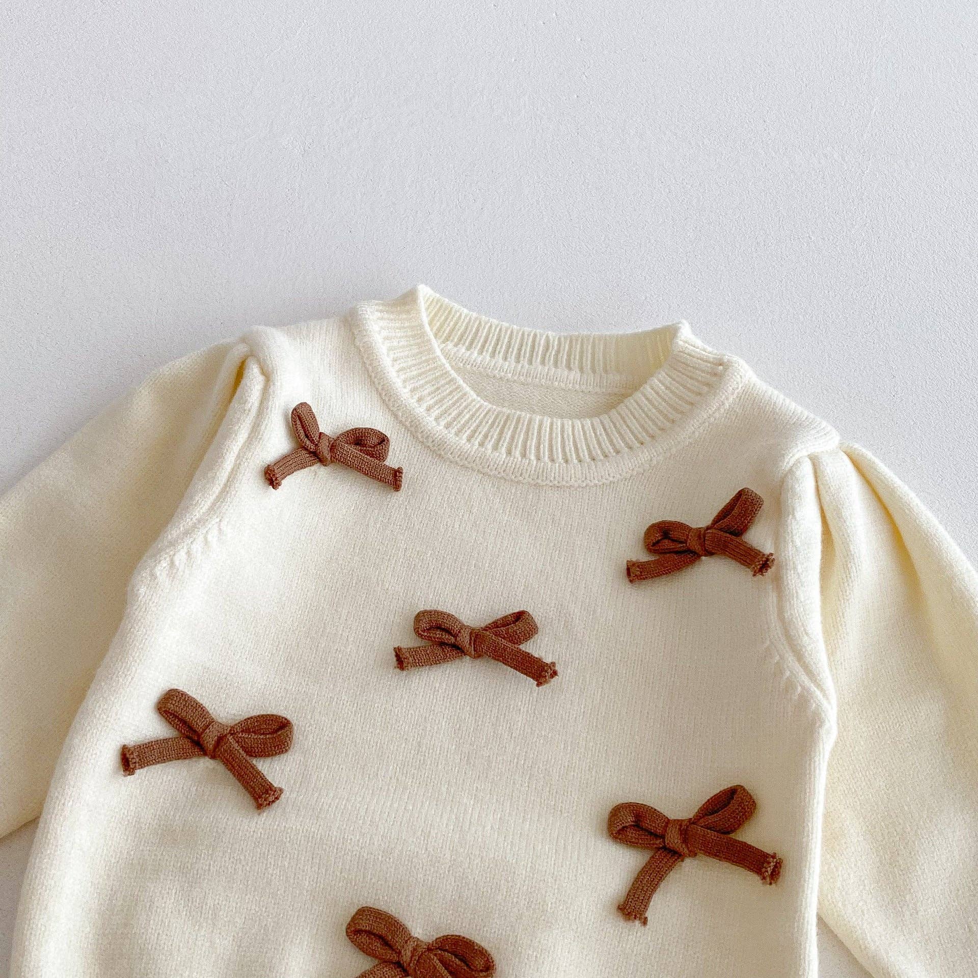 café léger Ensemble 3 pièces : Pull d'automne-hiver pour filles avec nœud, pantalon évasé et sac à main en vente sur Faire1