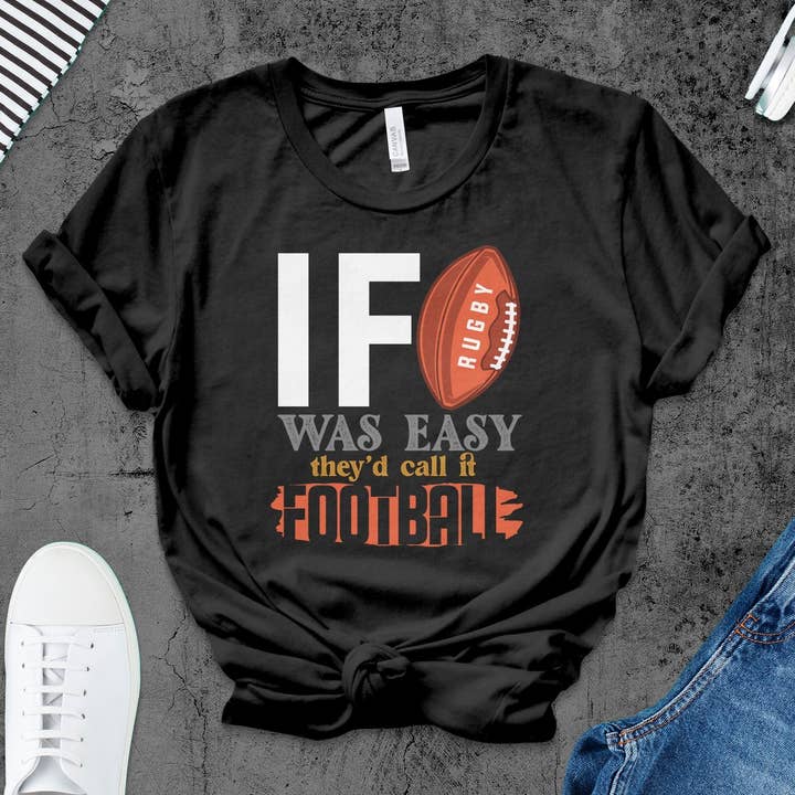 Divertente maglietta da rugby da uomo, con grafica «If It Was Easy They 'd call it football», camicia sportiva casual, idea regalo per amanti del rugby, abbigliamento sportivo per la vendita all'ingrosso da parte di FreakyTeeFactory