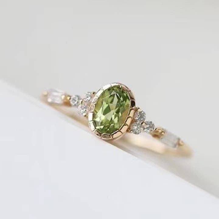 Revelari - Wholesale Multi-Stone Ring - Oval Green Gemstone Elegant Ring