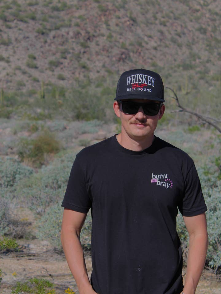 Whisky bent embroidered hat for wholesale by Burnt By Bray LLC