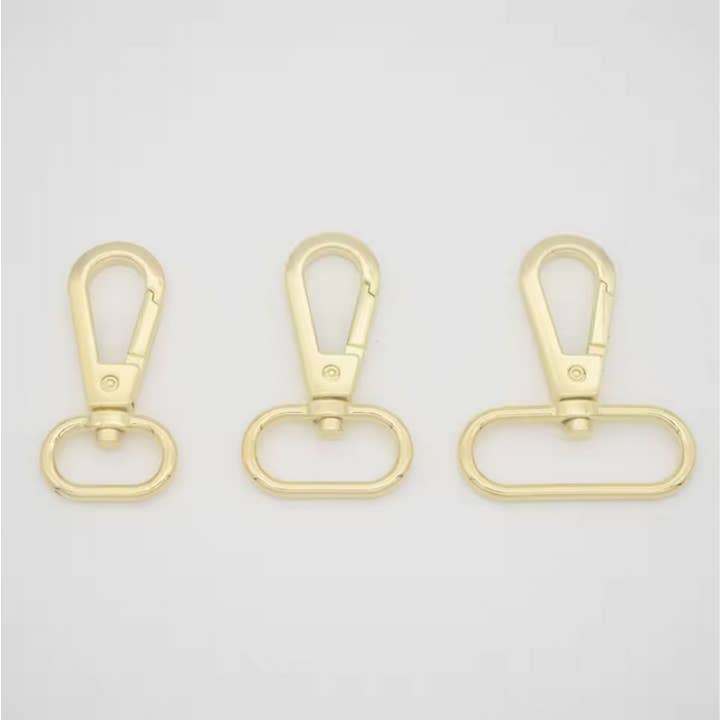 Yellow metal snap hook for pet buckles & key rings for wholesale by Radyan Fabrics