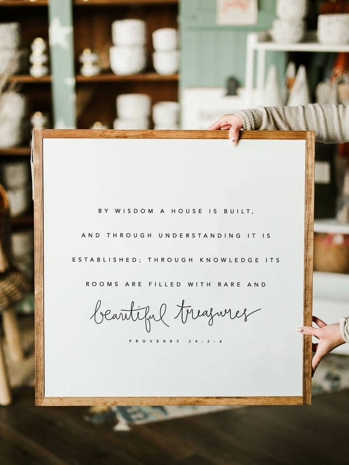By Wisdom A House Is Built Mixed Font Framed Wooden Sign for wholesale by The Shed Interiors