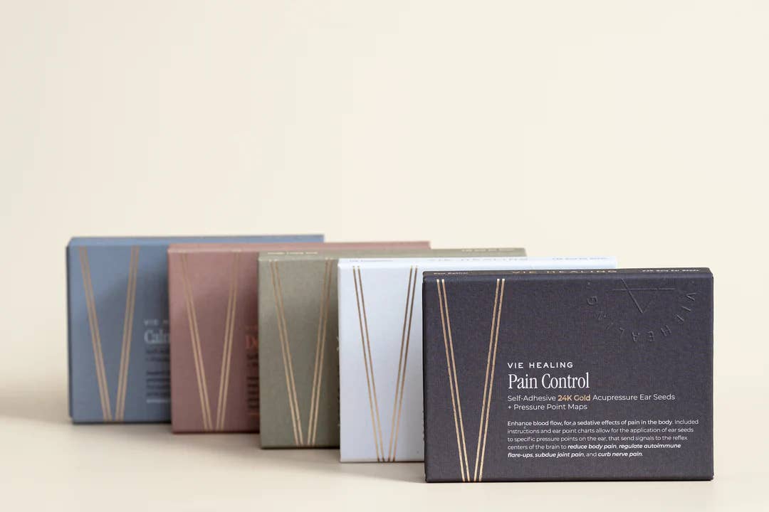 Confezione di semi auricolari in oro 24K per la vendita all'ingrosso da parte di VIE HEALING