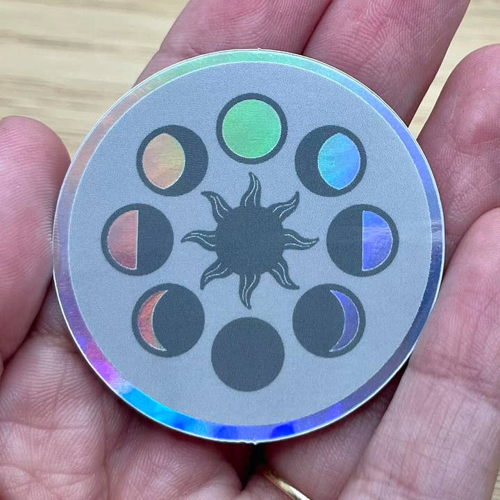 Holographic Moon Phases Sticker for wholesale by ArtisXan