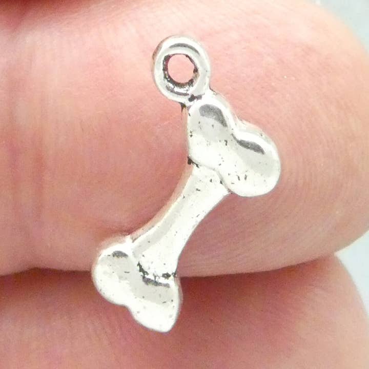12 Silver Dog Bone Charm Pendant 17x11mm by TIJC SP0590 for wholesale by Treasure Island
