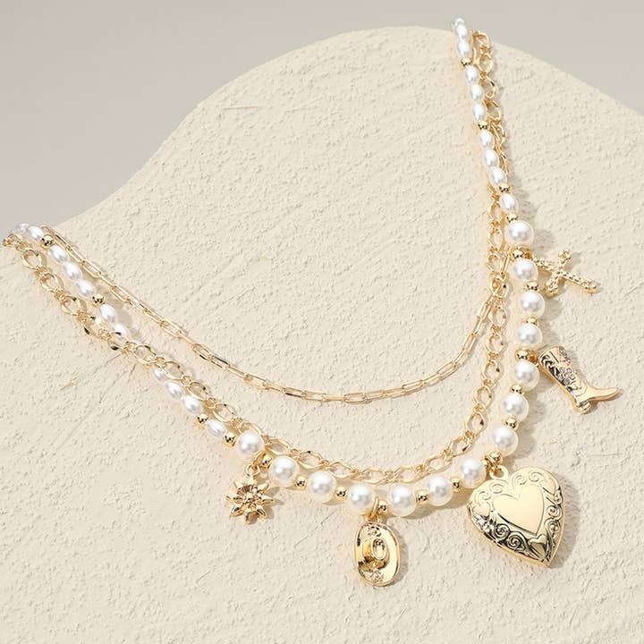 Metal Heart Locket Western Boot Cross Pearl Layered Necklace for wholesale by Sensibling Corp.
