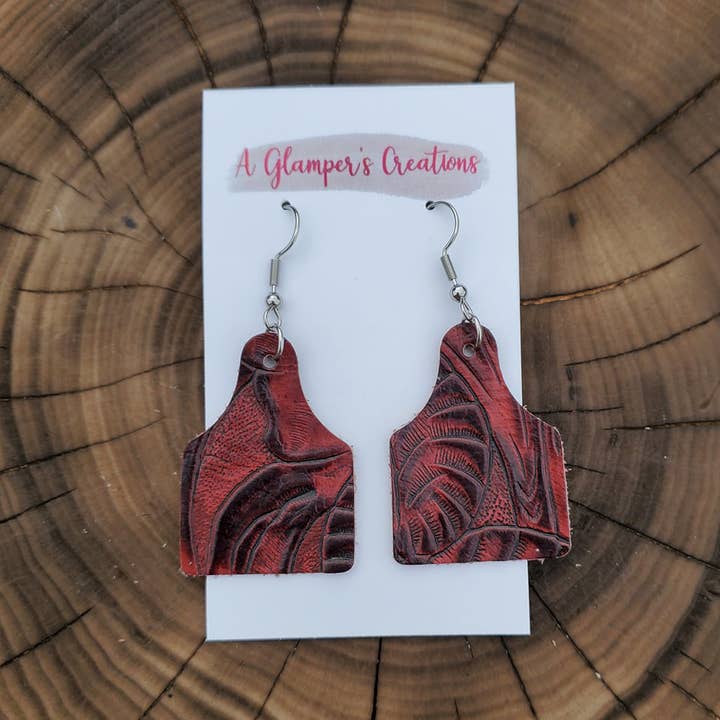 Deep Cherry Western Floral Cow Tag Leather Earrings for wholesale by A Glamper's Creations LLC