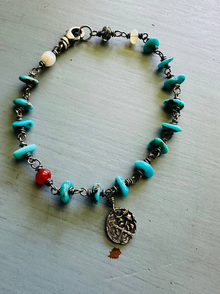 Handmade Bohemian Turquoise Sterling Silver Charm Bracelet for wholesale by Peaces of Indigo