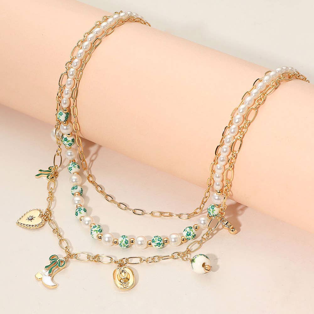 Sensibling Corp. - Wholesale Pendant/Charm Necklace - Western Cowboy Boot Hat Bow Cherry Heart Charm Station Pearl Floral Ceramic Ball Beaded Layered Necklace3