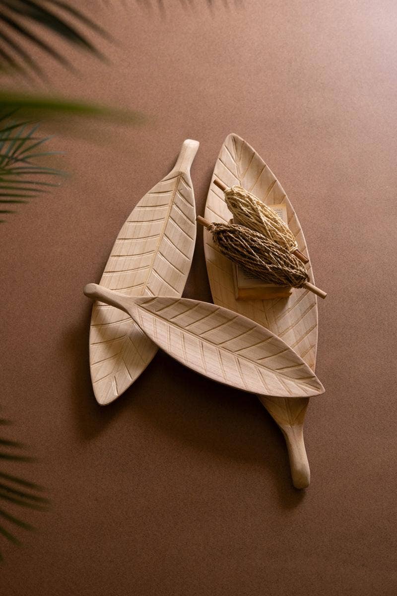 Natural SET OF THREE WOODEN LEAF TRAYS for wholesale on Faire