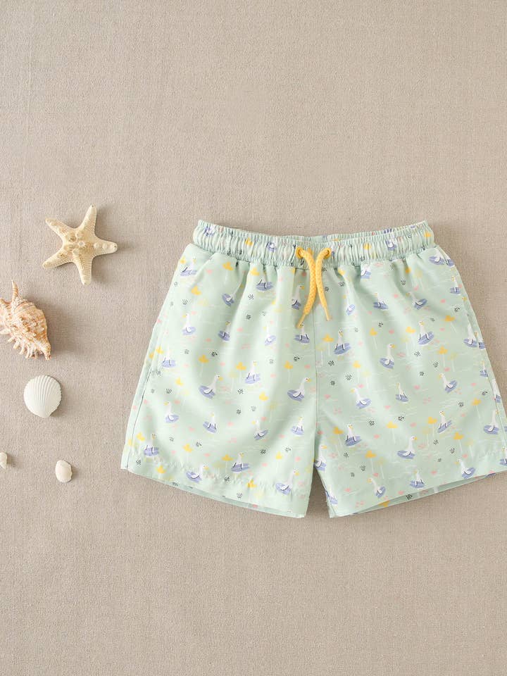 Aqua green children's swimsuit with goose print for wholesale by Dadati