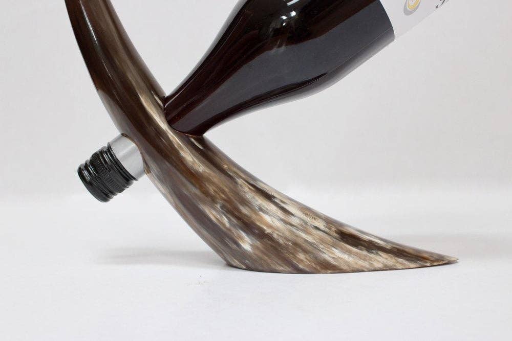 The African Home Goods – wholesale Bottle rack/holder – ANKOLE COW  WINE BOTTLE HOLDER - DARKER0