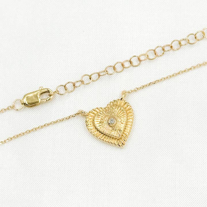 NFA71449. Collana con ciondolo a cuore in diamanti in oro massiccio 14k per la vendita all'ingrosso da parte di Tresor Jewelry Inc.