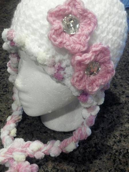 Pompadoodle Crochet Hat with Flowers for wholesale by Mad Hatter Farm