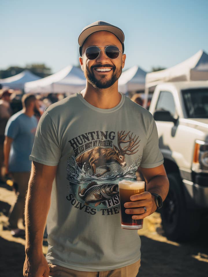 Maglietta: Caccia / pesca risolve la maggior parte dei miei problemi per la vendita all'ingrosso da parte di Zombie Paws