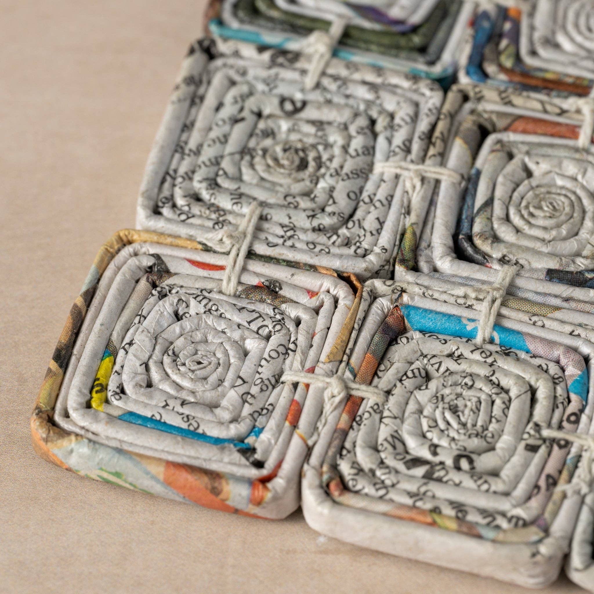 Ten Thousand Villages - Wholesale Trivet - Read All About It Recycled Newspaper Trivet1