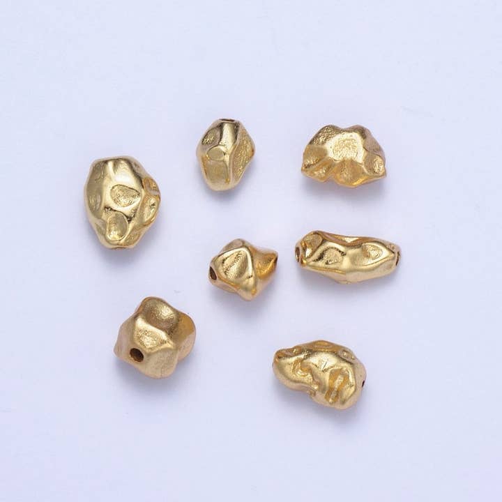 Distanziale Geometrico Astratto Martellato in Oro | B-014, B-016, B-029, B-041, B-044, B-045, B-048 per la vendita all'ingrosso da parte di Aim Eternal