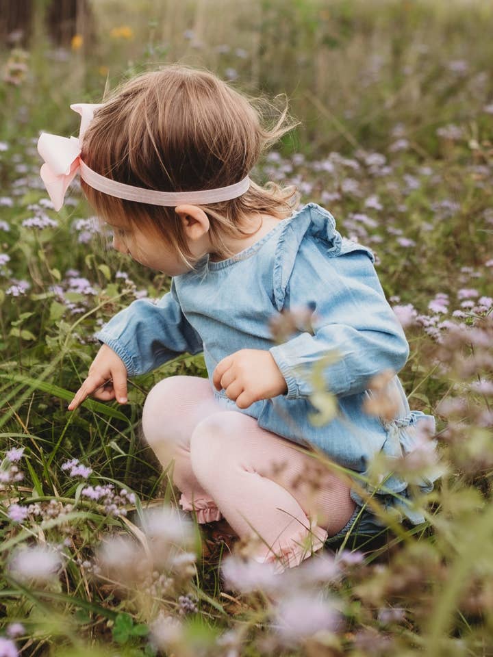 Blue Baby Girls Light Wash Denim Long Sleeve Flutter Bubble Romper
for wholesale on Faire5