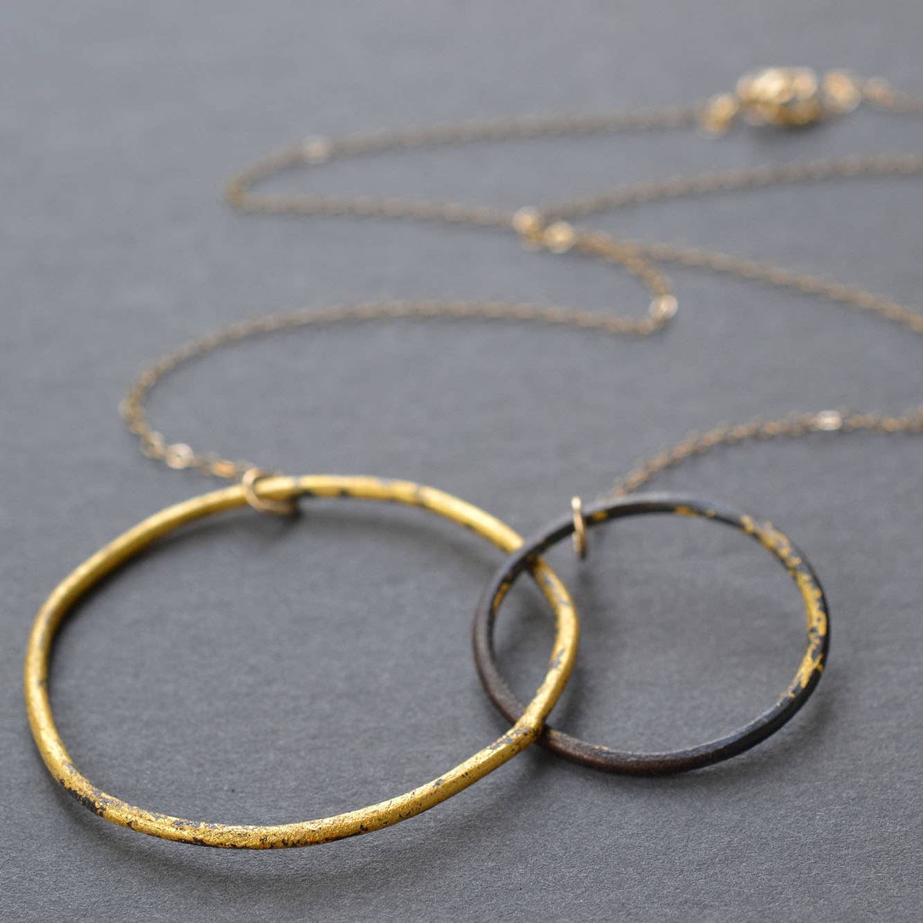 Metamorphosis Metals - Wholesale Pendant/Charm Necklace - Interlocking Circles Necklace Steel & Gold1