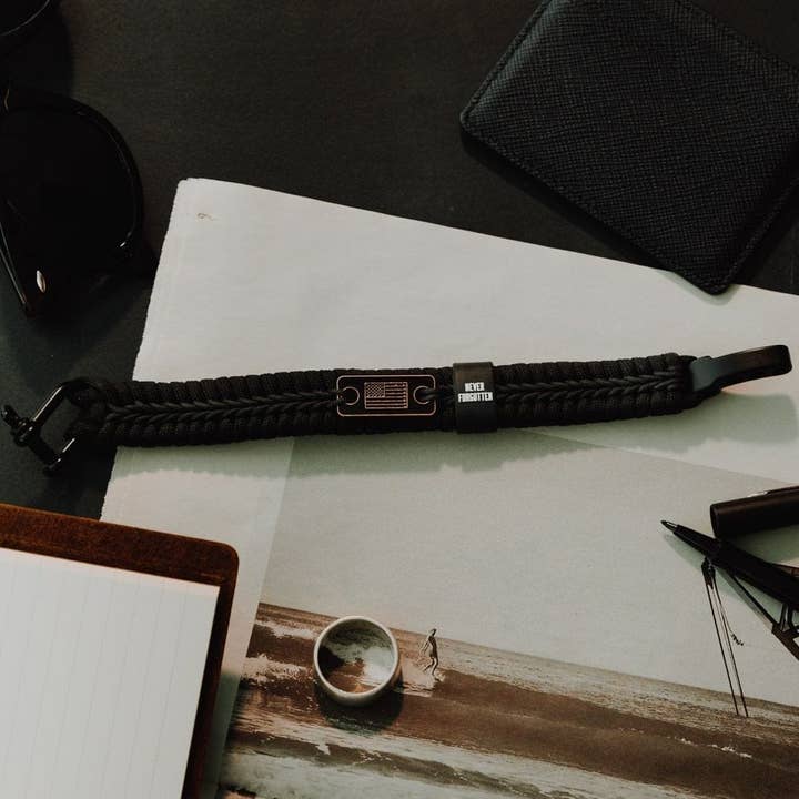 The Hero Company - Wholesale Woven/Braided Bracelet - Never Forgotten Black Paracord Bracelet: Helps Pair Veterans With A Service Dog Or Shelter Dog -Faire3