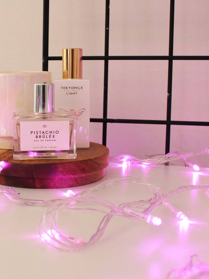 100 LED Clear Cable String Lights Plug In - Pink for wholesale by Perfect Holiday