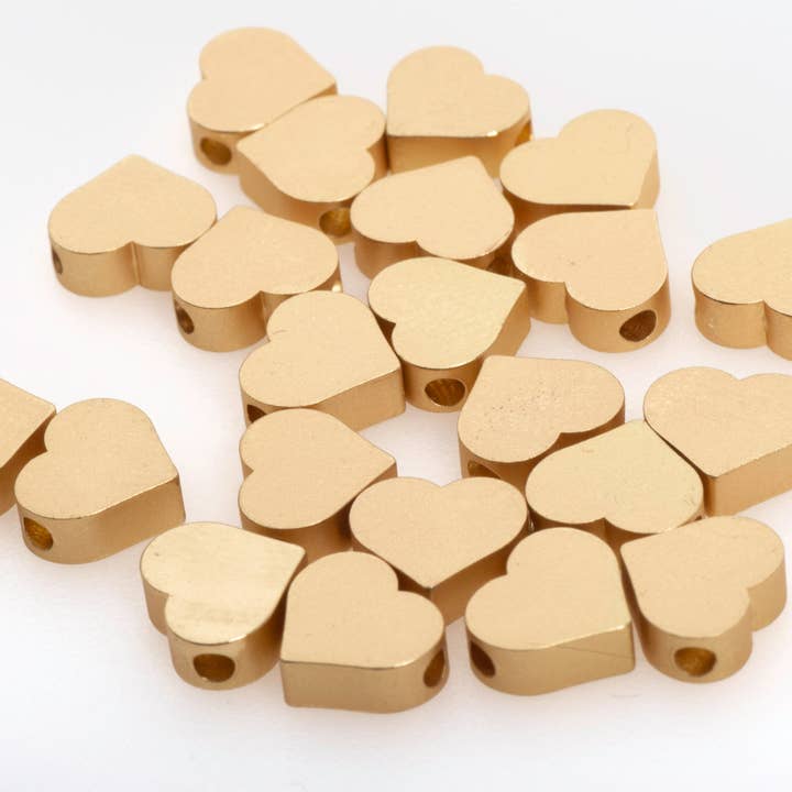 Conta em forma de coração sólido de 7mm x 6mm - Feita de zinco revestido - Vendida individualmente - K77 por atacado de Continental Beads