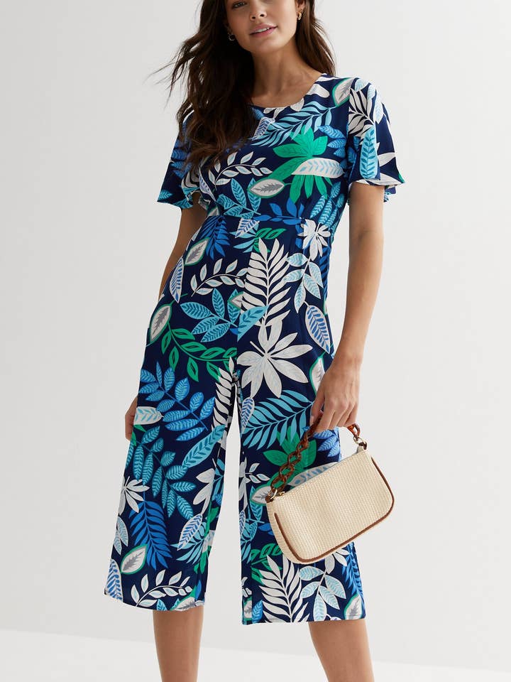 Combishort fleuri à taille nouée à manches évasées pour la vente par Cutie London