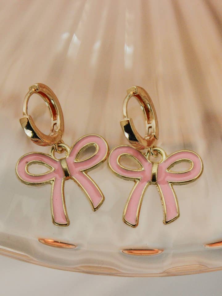 Pink Bow Huggie Hoops for wholesale by The Golden Girl Co.