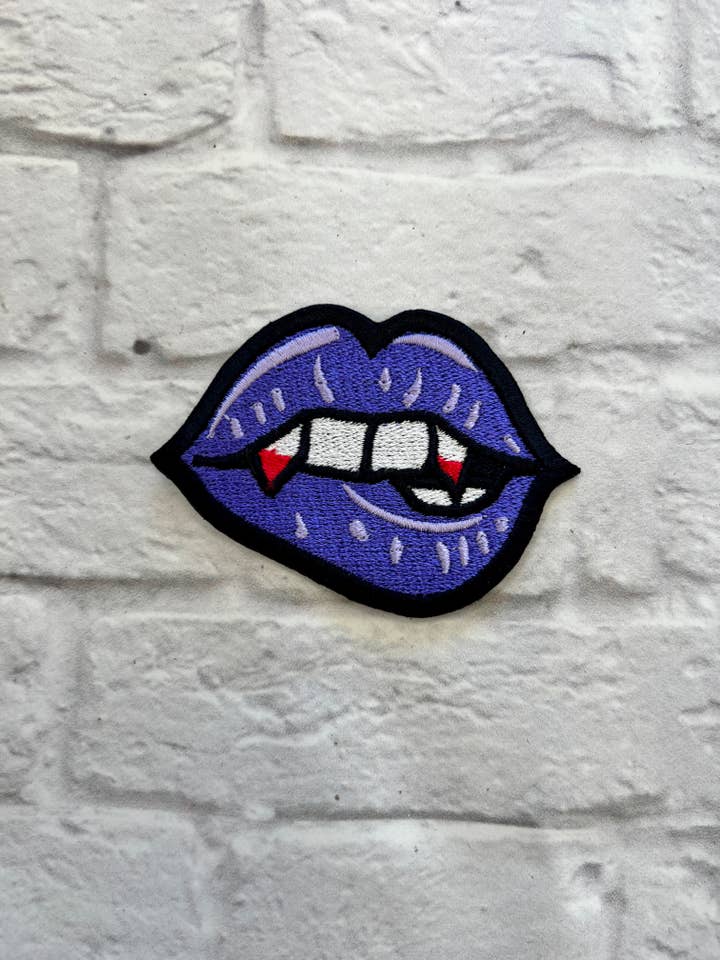Vampire Bite Lips Iron-on Patch for wholesale by Thread Tatts Creative Agency