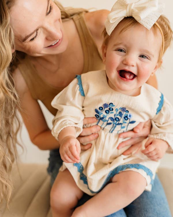 Natural Matera Embroidered Baby Dress & Bloomer (Organic Cotton) for wholesale on Faire13