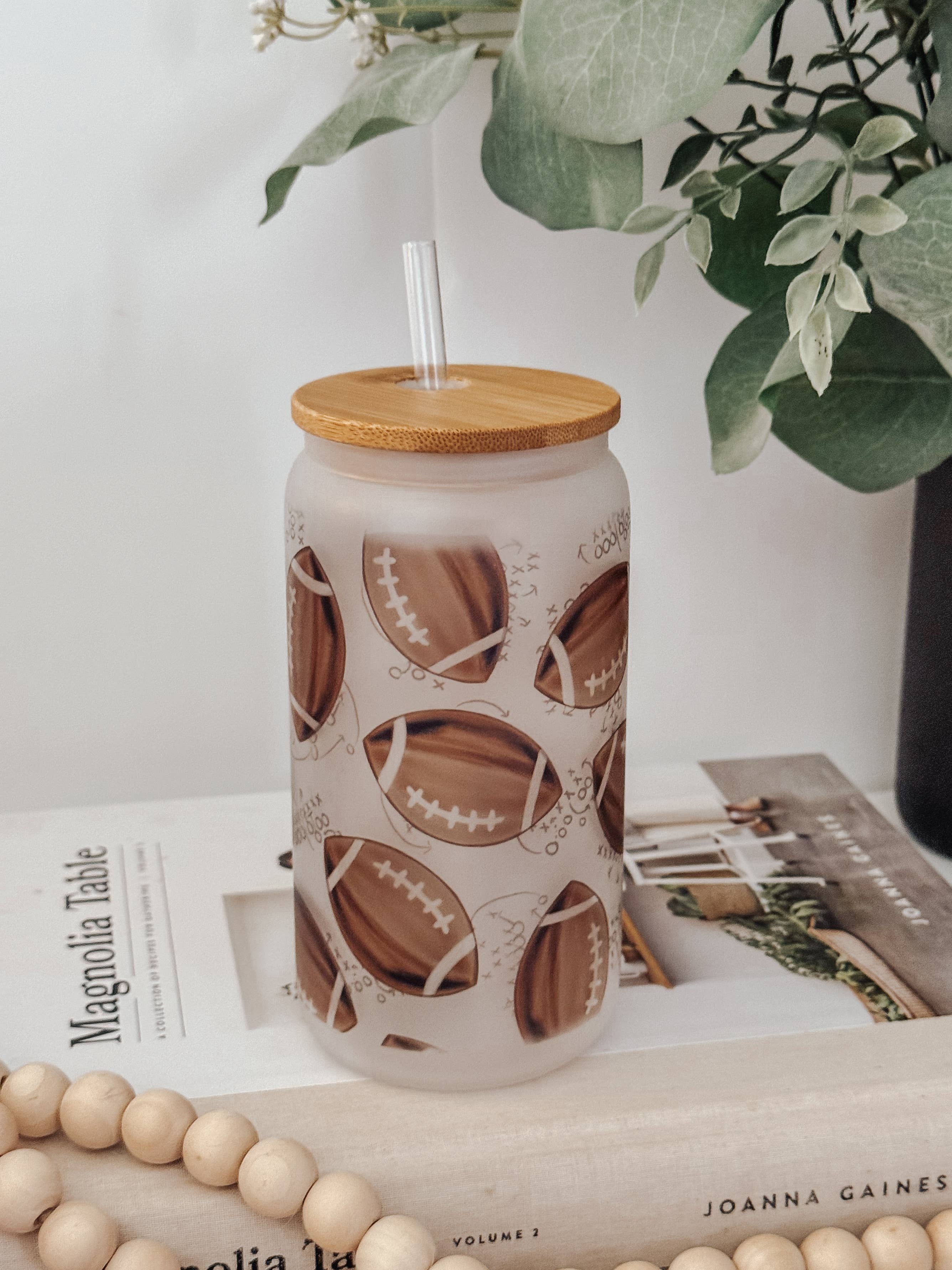 Onic Brands LLC - Wholesale Drinking Glass/Cup - Watercolor Footballs 16oz Glass Cup with Bamboo Lid6