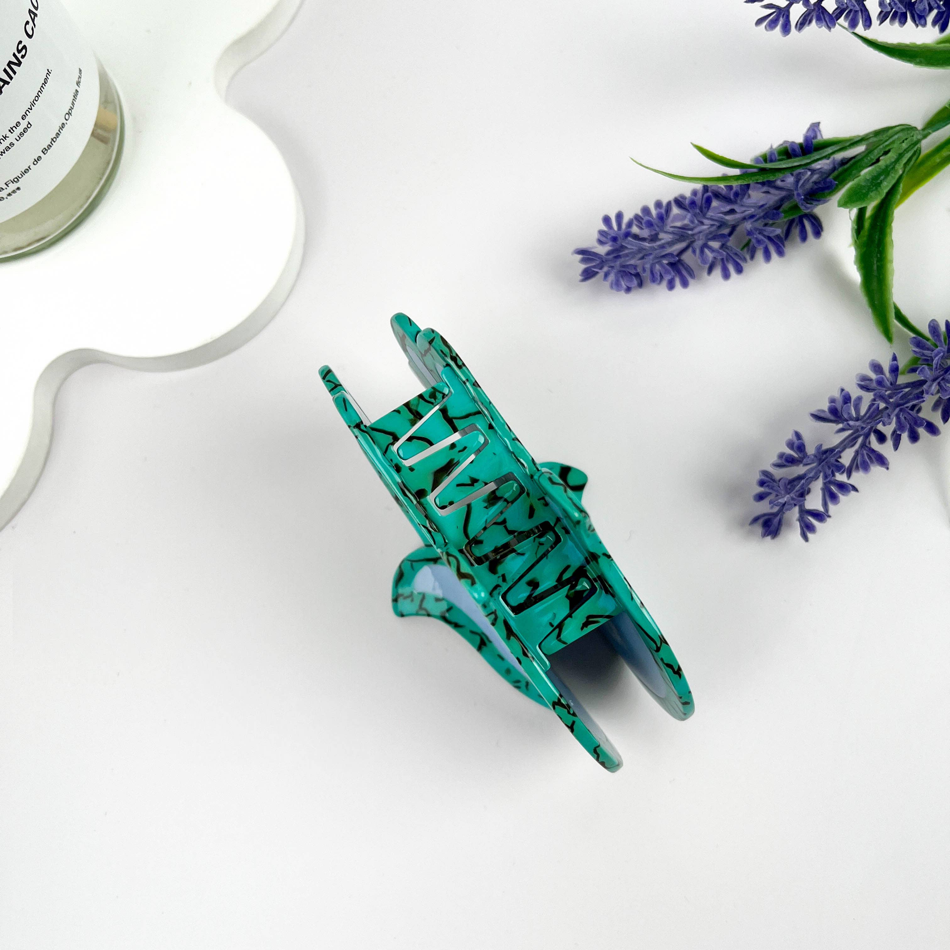 Green Neoclassical Buddha Hand Acetate Hair Claw Clip for wholesale on Faire4