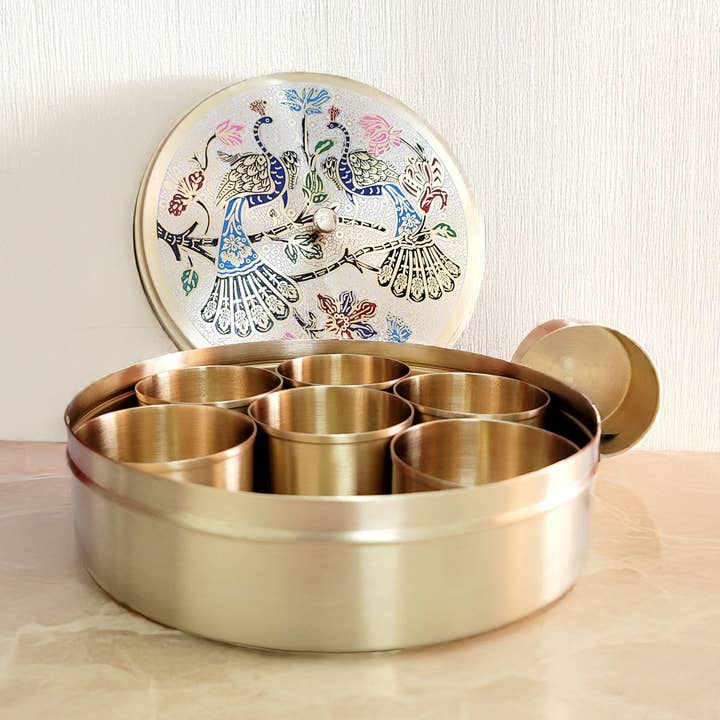 Handcrafted Brass Masala Dabba (Spice Box) – Etched Peacock Design, 7-Compartment, Available in 7” & 9” for wholesale by SAMA Homes