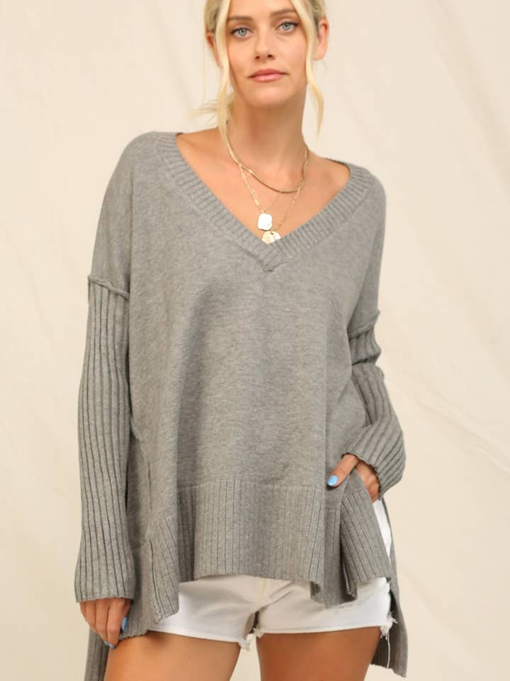 A V-Neckline With Ribbed Piercing Tunic Sweater for wholesale by KyeMi