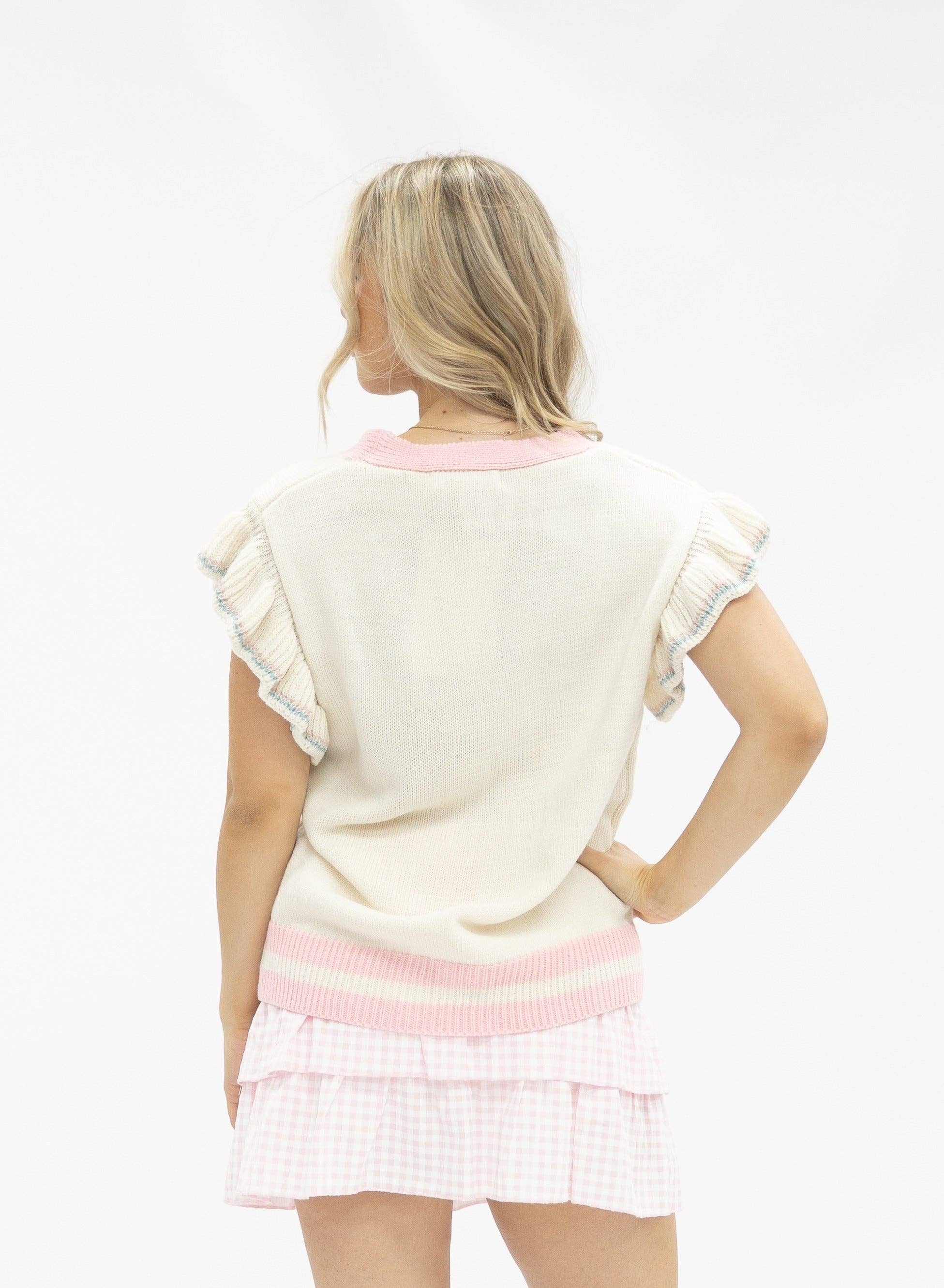 Ivory Sweater Vest with Sequin Bunnies for wholesale on Faire5