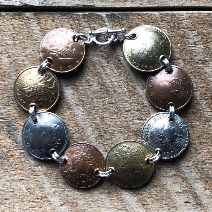 World Traveler Domed Coin Bracelet for wholesale by Lorraine Frances Jewelry