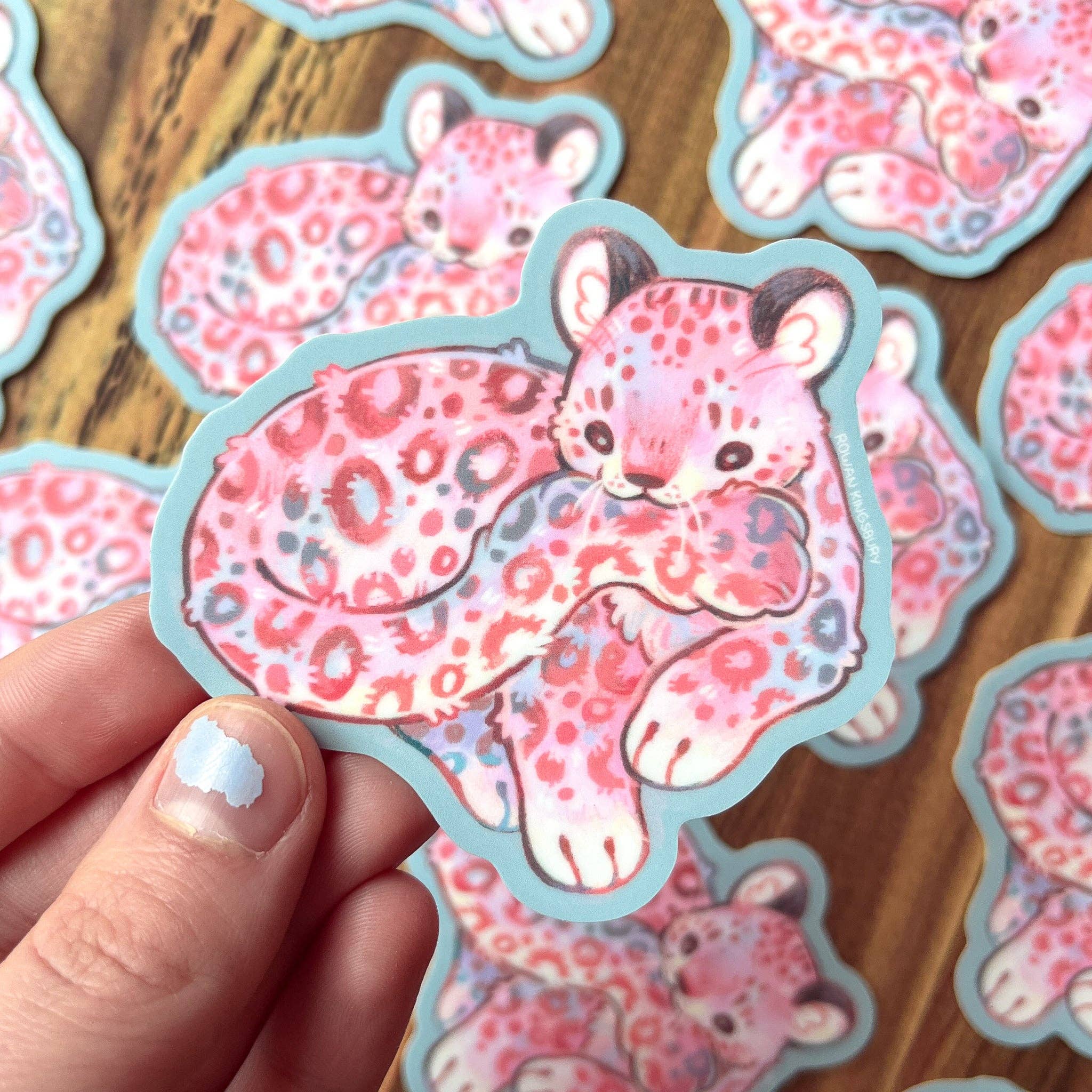 Rowan Kingsbury - Wholesale Sticker - Cuddly Snow Leopard Vinyl 3" Sticker1