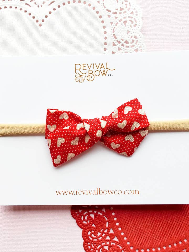 Valentine's Day Bow on Headband • Polka Dot Heart for wholesale by Revival Bow Co.
