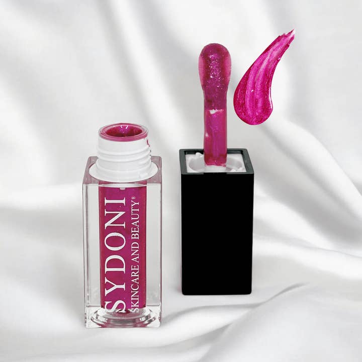 WISTERIA LIP OIL-VIOLET SHIMMER with JOJOBA AND SUNFLOWER OILS Net.Wt 0.16oz 4.8ml for wholesale by Sydoni Skincare and Beauty, Inc.