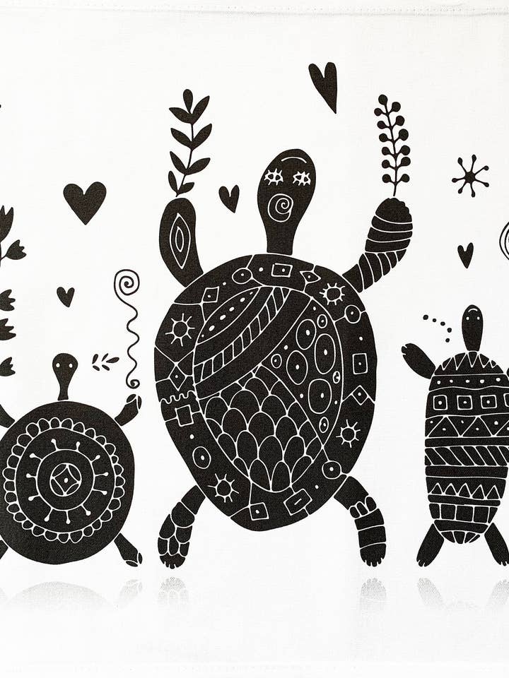 The Dancing Turtle Family Large Cotton Tea Towel for wholesale by Half a Donkey