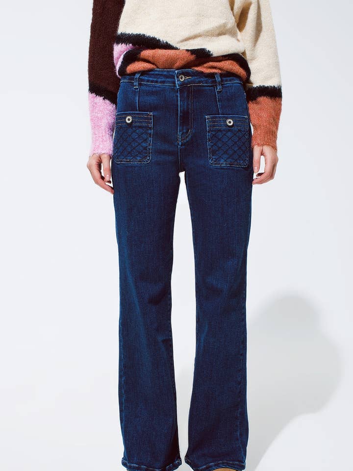 Blue jeans with buttoned pocket details in dark wash for wholesale by Q2—All Orders:Free Duties for the US,UK,and Canada