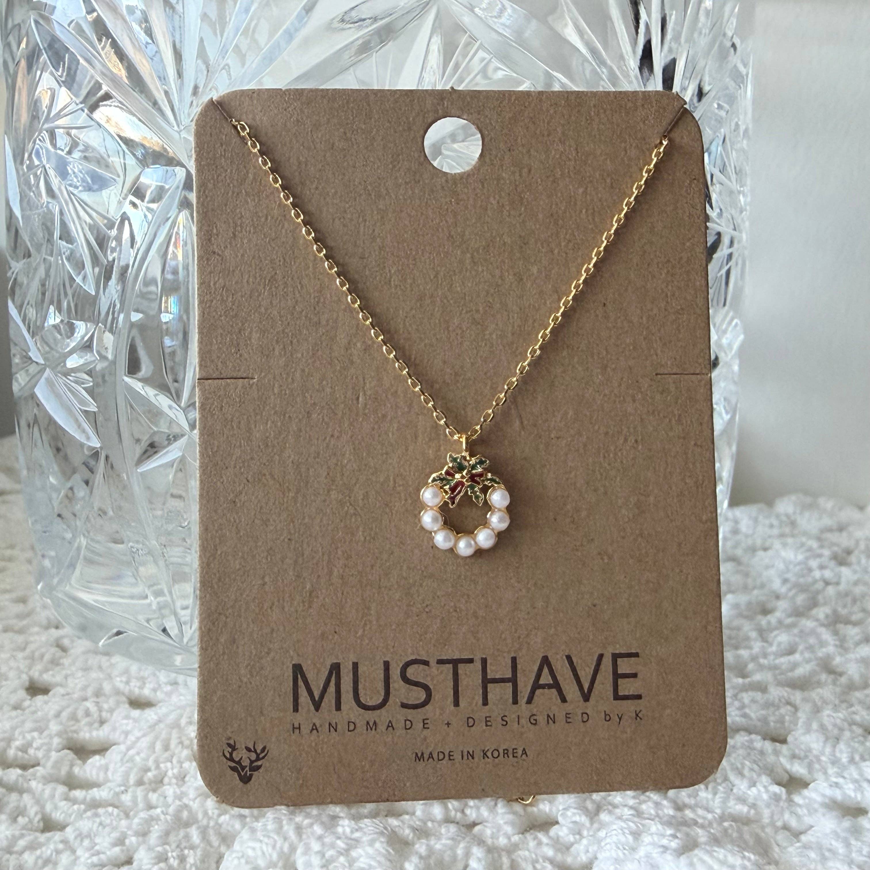 Gold Holiday Wreath Necklace for wholesale on Faire0