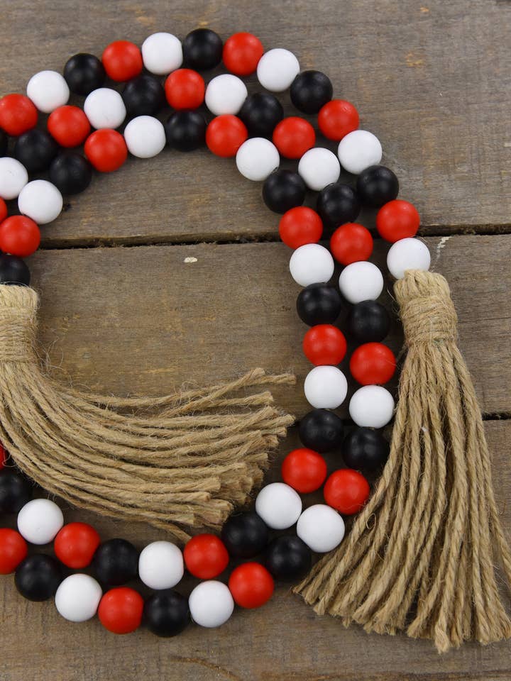 Röd Vit & Svart Pärlstav Garland 58in för wholesale av Wholesale Home Decor