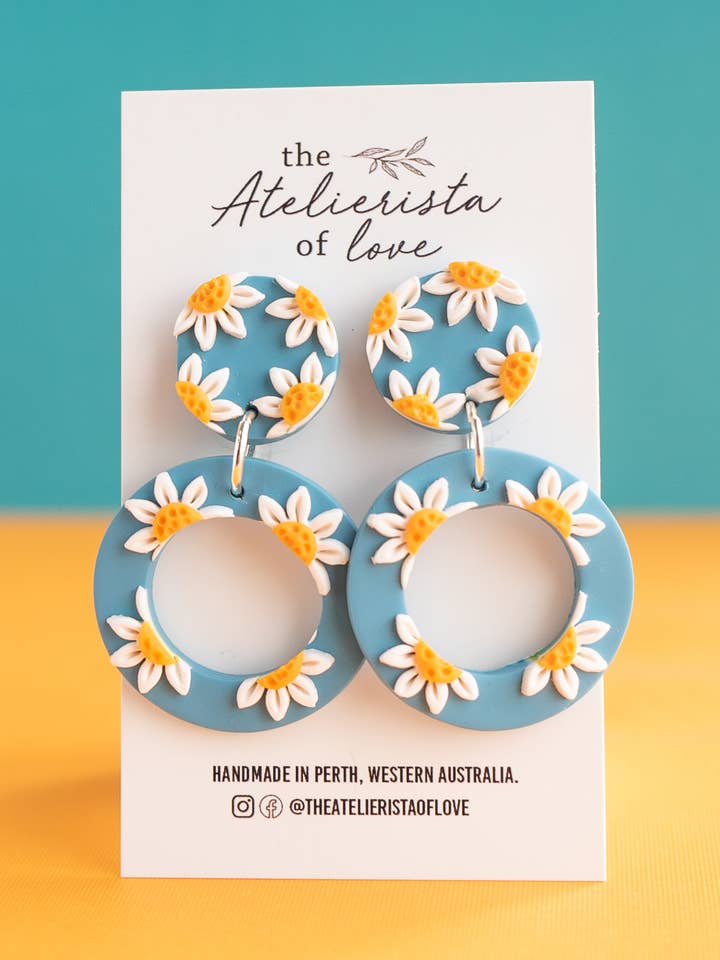 Daisies on Blue for wholesale by The Atelierista Of Love