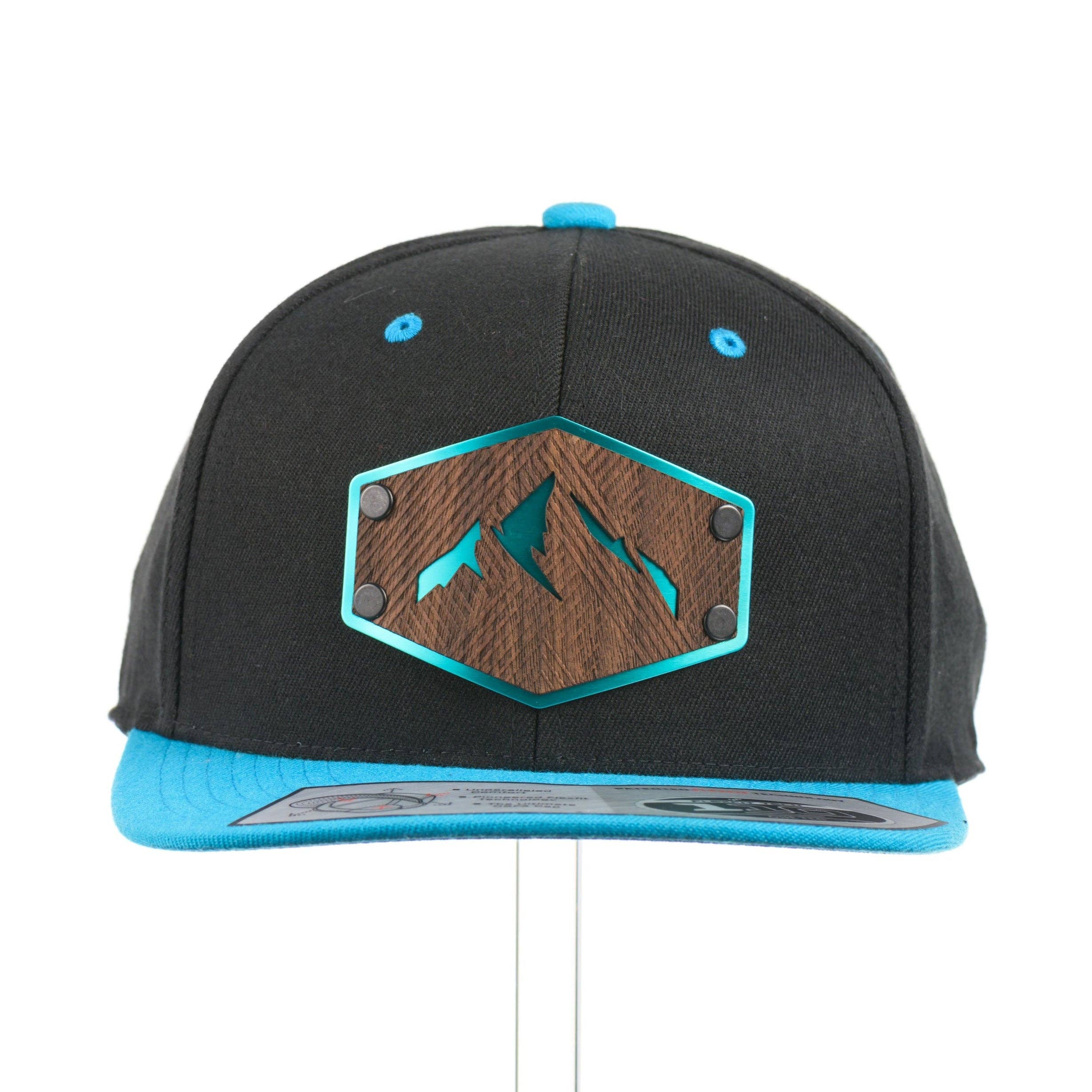 Walnut Wood Mountains Flexfit Black & Teal Flat Bill Hat for wholesale by Last Best Supply Co