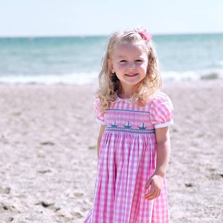 Smocked Pink Sailboat Dress for wholesale by Emily Lacey