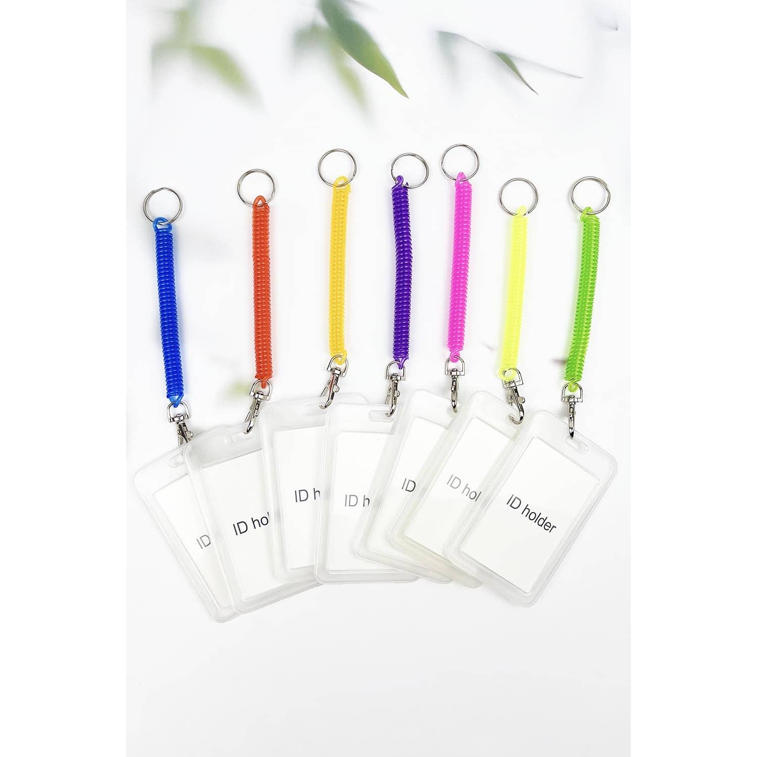 ASSORTED CLEAR ID BADGE HOLDER WITH COIL SPRING KEYCHAIN for wholesale on Faire1