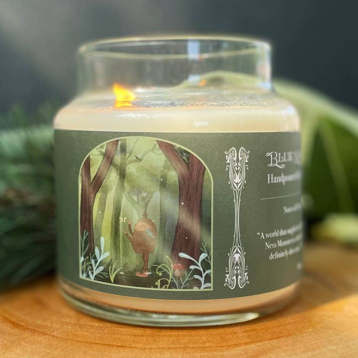 Blue Mountains || 16 oz. Cryptid Themed Candle | Cedar Scent and other Purchase Wholesale 7 day candle jars. Free Returns & Net 60 Terms on Faire trending on Faire.