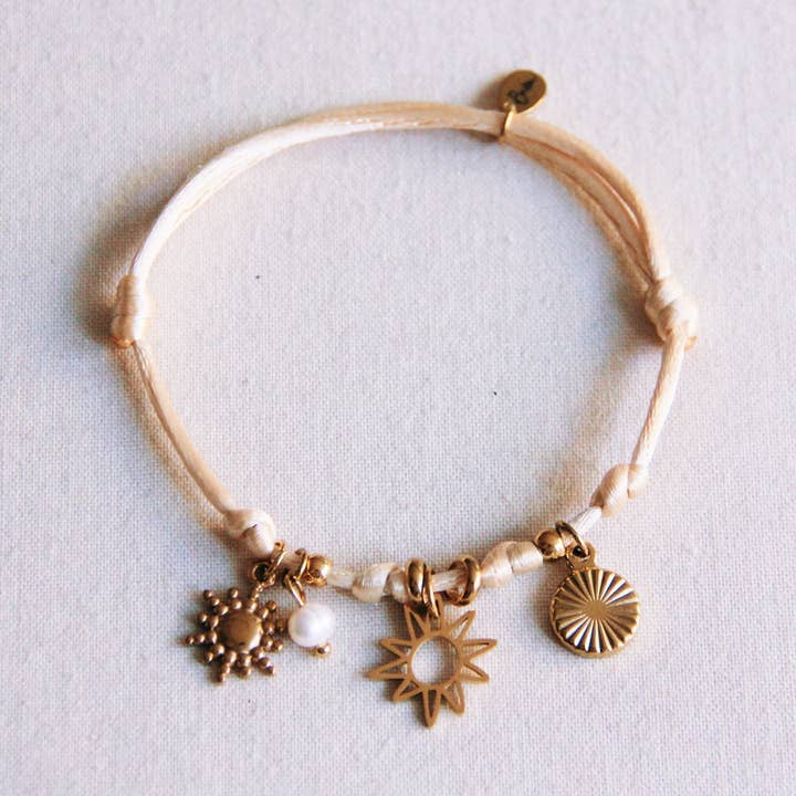 Satin charm bracelet with sun and mini pearl - sand for wholesale by Bazou