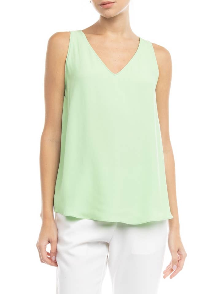 Ærmeløs top med knaplukning og nøglehulsudskæring på ryggen for engroshandel hos Naked Zebra